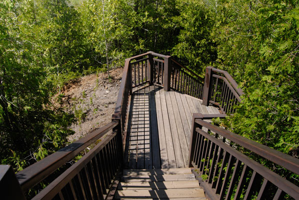 looking down flights of wooden stairs