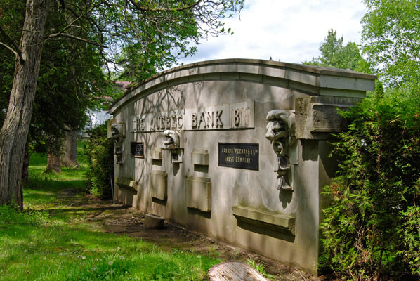 the stone front of a bank is a garden feature at Guild Park and Gardens